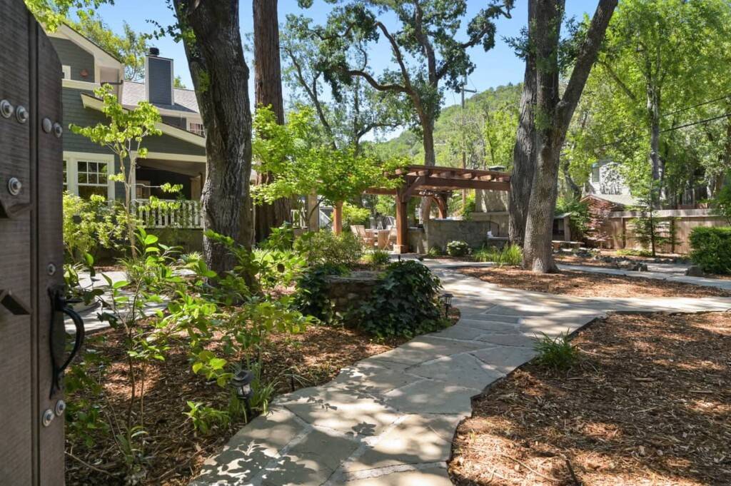 Elegant front gate leading onto the lush property grounds, an ideal choice for those looking to sell a Bay Area home.