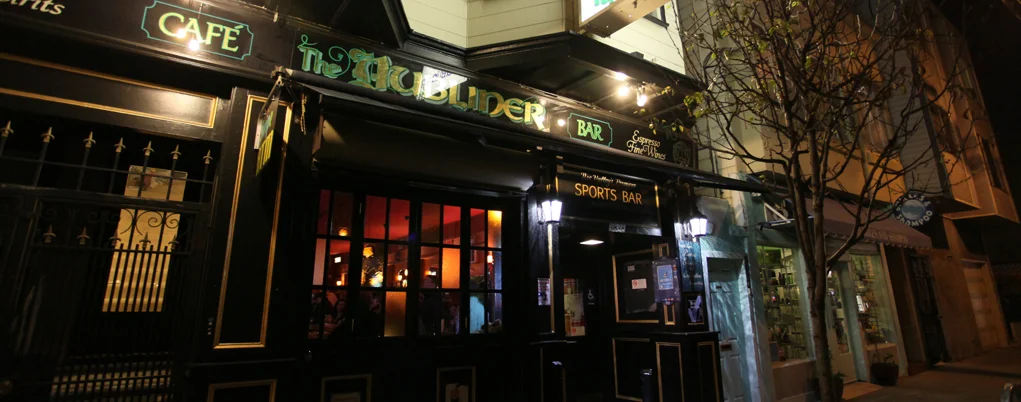 Night View of The Dubliner in Noe Valley Painted Dark With Tree Outside