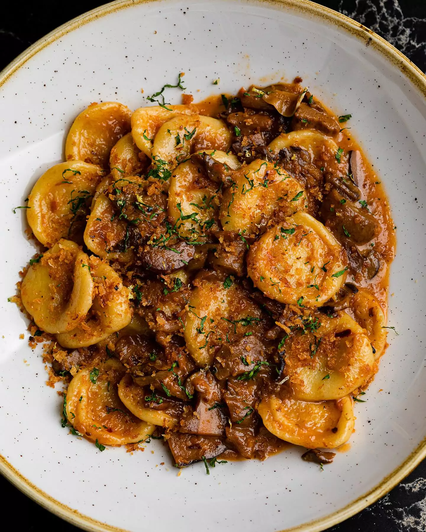 Homemade Pasta Dish with Red Sauce and Mushrooms from Italian Restaurant Itria in San Francisco