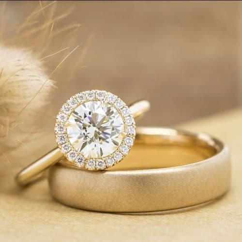 Close Up Photo of Brilliant Diamond Ring and Gold Wedding Band from La Bijouterie in San Francisco